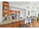 Well-equipped kitchen with stainless steel appliances, stylish countertops, and a breakfast bar at 1735 Maryland Ne Ave, St Petersburg, FL 33703