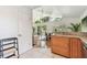 Modern kitchen with stone countertops and an open view into the dining and living areas at 1735 Maryland Ne Ave, St Petersburg, FL 33703