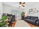 Comfortable home office featuring a large desk, comfortable seating, and ample natural light at 1735 Maryland Ne Ave, St Petersburg, FL 33703