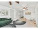 Spacious playroom featuring a comfortable green sofa and playroom decor, perfect for  at 1735 Maryland Ne Ave, St Petersburg, FL 33703