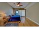 Spacious bedroom with a sliding glass door to a private balcony at 17735 Gulf Blvd # 202, Redington Shores, FL 33708
