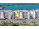 Beautiful condominium complex with covered parking, lovely balconies, and beautiful landscaping at 17735 Gulf Blvd # 202, Redington Shores, FL 33708
