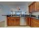 Chef's kitchen offers granite countertops, stainless appliances, and views of the water at 17735 Gulf Blvd # 202, Redington Shores, FL 33708