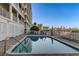 Community pool and lounge area overlooking the marina provide a relaxing outdoor space at 17735 Gulf Blvd # 202, Redington Shores, FL 33708