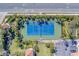 Well-maintained tennis court with surrounding landscaping, providing residents with recreational opportunities at 17735 Gulf Blvd # 202, Redington Shores, FL 33708
