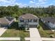 This aerial view shows a charming home and surrounding landscape at 1823 Moon Cactus Ct, Ruskin, FL 33570