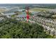 Aerial view of a well-planned community, highlighting the proximity to water features and natural surroundings at 1823 Moon Cactus Ct, Ruskin, FL 33570