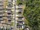 Aerial view highlighting single Gathering homes, landscaping, nearby streets and adjacent tree preserve at 1823 Moon Cactus Ct, Ruskin, FL 33570