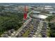 An aerial view showing proximity to water features and natural surroundings within a neighborhood community at 1823 Moon Cactus Ct, Ruskin, FL 33570