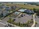 Aerial view of community amenities, including a pool, clubhouse, and basketball court at 1823 Moon Cactus Ct, Ruskin, FL 33570