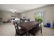 Inviting dining room perfect for Gathering meals and gatherings, with adjacent living spaces at 1823 Moon Cactus Ct, Ruskin, FL 33570