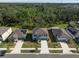 Charming two-story home with landscaped front yard and inviting curb appeal in a residential neighborhood at 1823 Moon Cactus Ct, Ruskin, FL 33570