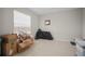 Bright room with a large window and tiled flooring at 1823 Moon Cactus Ct, Ruskin, FL 33570