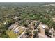 Aerial view of the community showcasing lush greenery and neighborhood layout at 18816 Carr Dr, Lutz, FL 33559