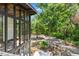 View of yard with custom windows with backyard access at 18816 Carr Dr, Lutz, FL 33559