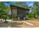 Unique home with striking architectural details and well-maintained landscaping at 18816 Carr Dr, Lutz, FL 33559