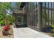 Outdoor patio featuring a dining area and modern architecture, perfect for relaxation at 18816 Carr Dr, Lutz, FL 33559