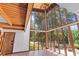 Bright sunroom with wood-paneled ceiling and expansive windows offering natural light and views at 18816 Carr Dr, Lutz, FL 33559
