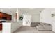 Open living area with a breakfast bar and a view of the connected living room at 2131 River Turia Cir, Riverview, FL 33578