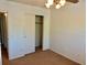 Bedroom featuring a closet and neutral tones at 2287 Philippine Dr # 29, Clearwater, FL 33763
