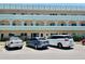 Low-rise condo building with neatly parked cars in the parking area, offering convenient residential living at 2287 Philippine Dr # 29, Clearwater, FL 33763