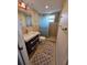Updated bathroom featuring tile walls, modern fixtures, and a glass-enclosed shower at 2310 Medford Ln, Brandon, FL 33511
