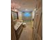 Neutral bathroom with glass door shower and lovely vanity sink at 2310 Medford Ln, Brandon, FL 33511