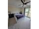 Bedroom with plush carpet, ceiling fan and bright natural light at 2310 Medford Ln, Brandon, FL 33511