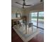 Bright dining area with sliding doors that lead to the outside, creating a perfect spot for meals and gatherings at 2310 Medford Ln, Brandon, FL 33511