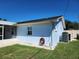 View of the side of the house and back yard at 2310 Medford Ln, Brandon, FL 33511