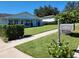 Charming single-story home with a well-manicured lawn and inviting curb appeal at 2310 Medford Ln, Brandon, FL 33511
