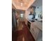 Bright, modern kitchen with stainless steel appliances, eat in island, and light wood cabinets at 2310 Medford Ln, Brandon, FL 33511