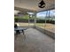 Lanai with tiled floors and screened in exterior at 2310 Medford Ln, Brandon, FL 33511