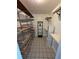 Spacious walk-in closet with shelving, drawers, and ample storage space for organizing clothes and accessories at 2310 Medford Ln, Brandon, FL 33511