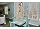 Cozy breakfast nook bathed in sunlight with modern light fixture at 2513 Newbern Ave, Clearwater, FL 33761
