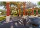 Community car wash station featuring multiple bays and a pergola roof at 2717 Via Cipriani # 631B, Clearwater, FL 33764