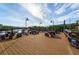Scenic dock with picnic tables, perfect for enjoying waterfront views and outdoor dining at 2717 Via Cipriani # 631B, Clearwater, FL 33764