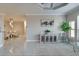 Bright living room features tile flooring, modern decor, and an open floor plan at 2717 Via Cipriani # 631B, Clearwater, FL 33764