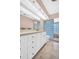 Bathroom with vanity and glass block feature at 307 Orangewood Ln, Largo, FL 33770