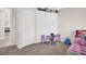 bedroom with play table, and large closet at 307 Orangewood Ln, Largo, FL 33770