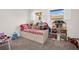 Bright bedroom with a play area and natural light at 307 Orangewood Ln, Largo, FL 33770