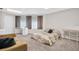 Large bedroom has a comfortable seating area, and natural lighting and two desk spaces at 307 Orangewood Ln, Largo, FL 33770