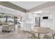 Open-concept kitchen and dining area with views to backyard at 307 Orangewood Ln, Largo, FL 33770