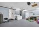Spacious garage with light blue walls features ample storage and a utility sink at 307 Orangewood Ln, Largo, FL 33770