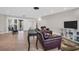 Living room featuring a modern design, wood floors, and natural light at 307 Orangewood Ln, Largo, FL 33770
