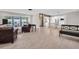 An open-concept living area seamlessly connects to the dining and kitchen spaces at 307 Orangewood Ln, Largo, FL 33770