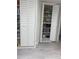 Pantry with shelving and louvered doors at 307 Orangewood Ln, Largo, FL 33770