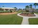 Community playground featuring slides, swings, and shaded area at 32829 Woodthrush Way, Wesley Chapel, FL 33545