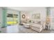 Bright living room with modern furnishings and an outdoor patio at 33096 Osprey Peak Way, San Antonio, FL 33576