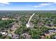 Aerial view of the neighborhood with lush green trees and residential houses at 4034 Paddlewheel Dr, Brandon, FL 33511